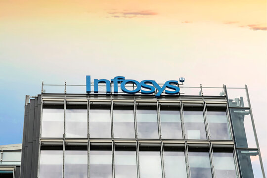 Bucharest, Romania- Aug, 2022: Infosys logo on top of the office building . Infosys is an Indian company specialized in Outsourcing, business consulting and information technology.