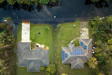 Surrounded by hurricane Ian rainfall flood waters homes in Florida residential area. Consequences...