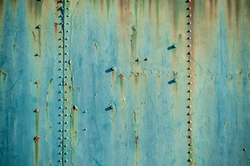 old metal plate with rust with rivets, texture or background