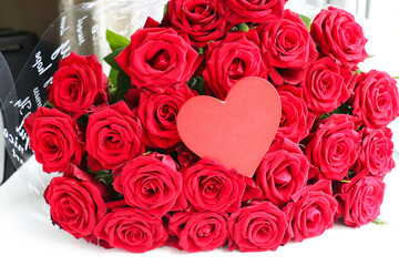 greeting card happy valentine's day. bouquet of roses and red heart