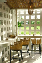 table and chairs and a cat