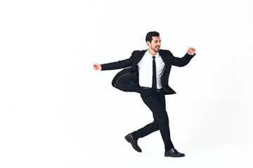 Man business smile with teeth in costume running and jumping up open mouth happiness and surprise full-length on white isolated background copy place 