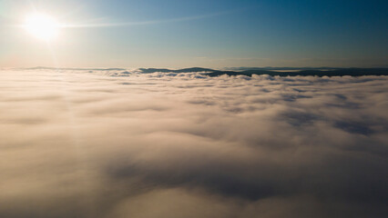 Перейти к странице
|123Далее
Sunrise and Horizon over the clouds cover mountains ridge