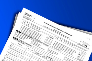Obraz premium Form 1065 (Schedule K-2) documentation published IRS USA 44478. American tax document on colored