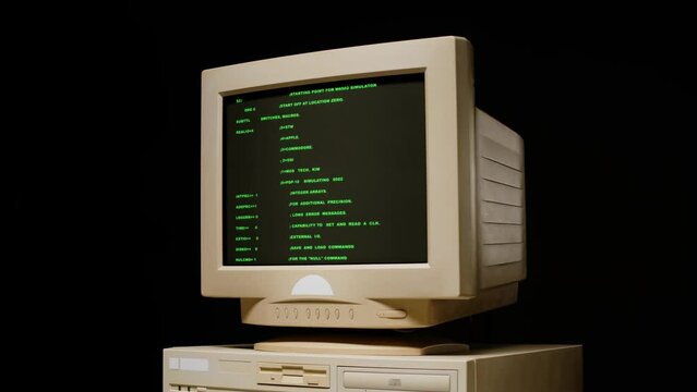 Retro pc with loading code console, programmer making scripts, green basic screen, Old computer studio close-up, Desktop vintage retro wave display, late 90s PC.