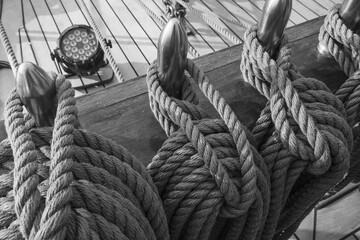 Sailboat sizal ropes. Naval ropes.. Selective focus. Black and white image.