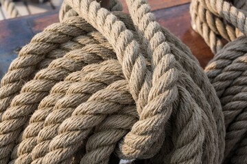 Fototapeta na wymiar Sailboat sizal ropes. Naval ropes.