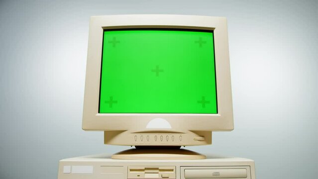 Retro pc with chroma key green screen, Old computer studio close-up, Desktop vintage retro wave display, late 90s PC mock up for 3d motion design and advertising. 