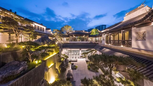 time lapse of luxury yard villa at night