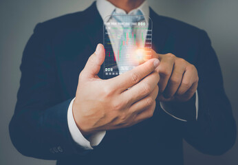 Businessman analysing trading graph financial data. Business finance background.Business finance technology and investment concept.2023 business finance technology and investment concept.