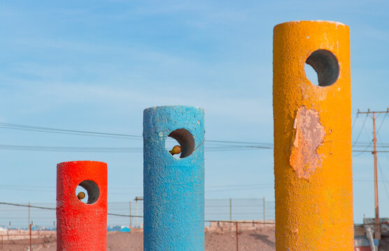 cement bars in colors on blue background