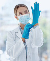 Doctor mask, covid gloves and woman ready for operation, surgery or examination. Health, healthcare and medical female professional safety ppe, corona virus or bacteria, germs and disease prevention