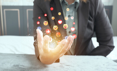 Social media and online digital concepts Coming out as a hologram icon : Concept holiday living and social media social distancing, working from home.