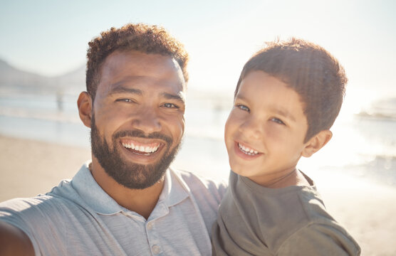 Happy, father and son portrait smile in beach fun, vacation and break in summer happiness together. Dad and child selfie smiling in fun outdoor bonding free time on a sunny day at the ocean