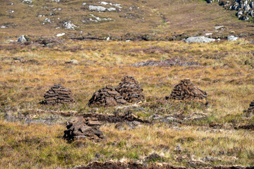 Peat cutting on the Isle of Harris in the Outer Hebrides of Scotland