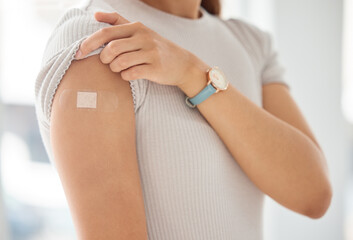 Covid, vaccine and woman with plaster on arm, medical shoulder injection dose and immunization...