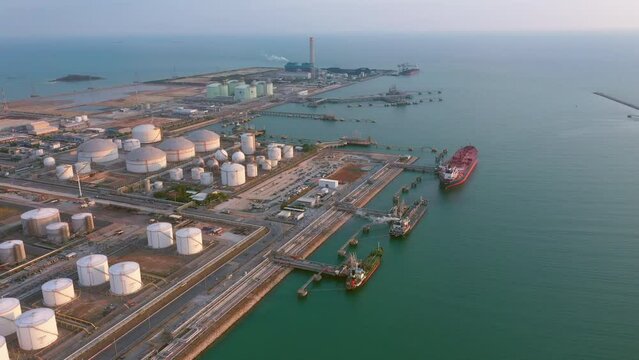 Oil refinery of business logistic sea going ship, the natural gas pipeline for oil delivery ships. to Port of europe-Cargo ship import export, international order concept. 