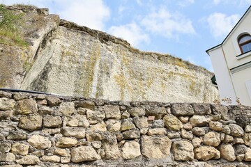 Ancient stone fence and the foot of the mountain