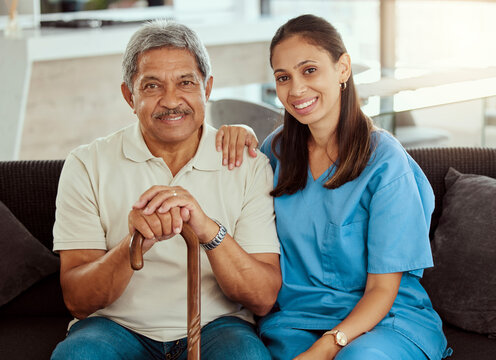 Nurse, Portrait And Senior Man Bonding, Sitting On Sofa During A Checkup At Assisted Living Facility. Elderly Care, Support And Nursing With Young Woman Caregiver Help, Retirement And Treatment