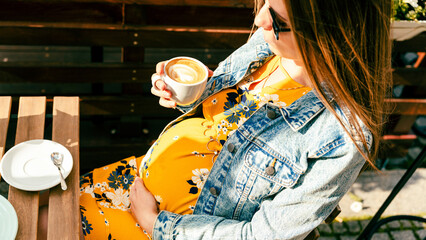 Obraz na płótnie Canvas Pregnant woman coffee drink. Lifestyle morning with happy pregnancy girl drink espresso coffee. Represent breakfast, energy, freshness or great aroma concept.