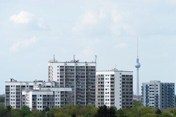 Prefabricated high-rise buildings in Gropiusstadt with the Berlin TV tower