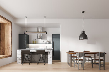 Light kitchen interior with bar countertop and dining table, panoramic window