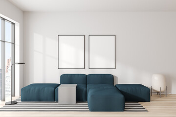 Light living room interior with couch and panoramic window. Mockup frames