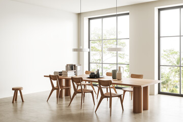 Cozy guest room interior with table and chairs, panoramic window. Copy space