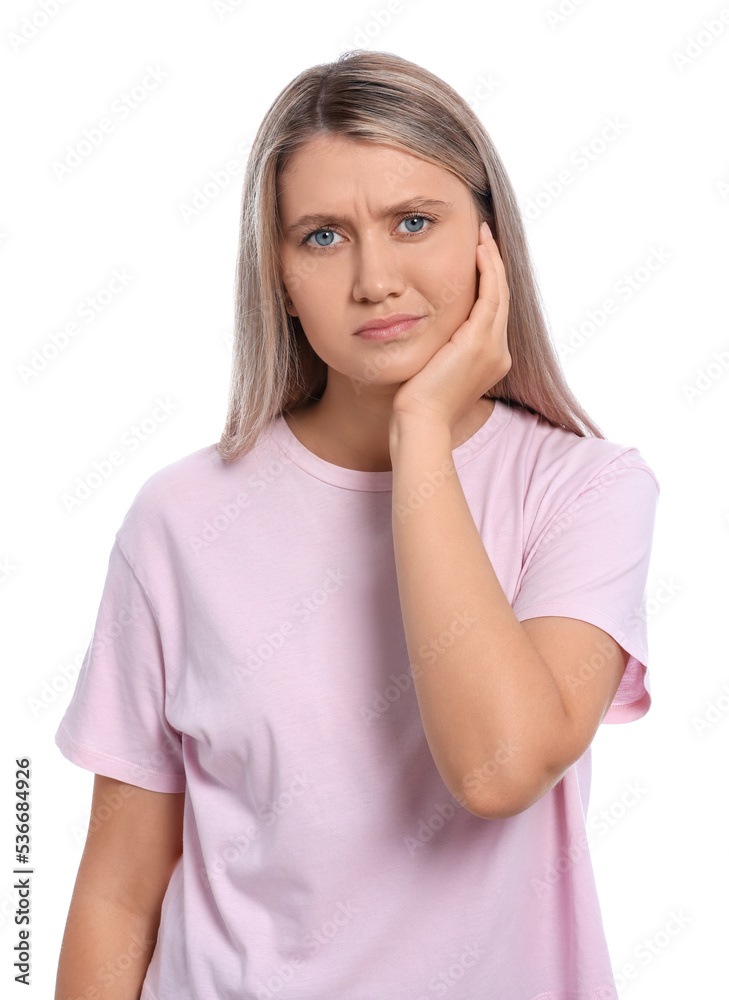 Wall mural Young woman suffering from ear pain on white background