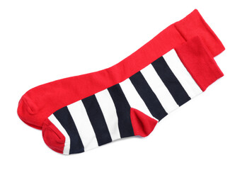 Different colorful socks on white background, top view