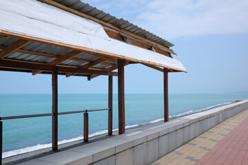 Canopy with picturesque view of beautiful blue sea