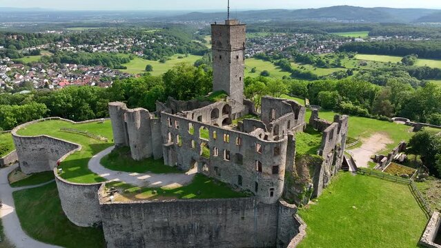 Castle K&ouml;nigstein on a Hill, State of Hesse, Germany. European castle, fortress ruin from above with aerial drone shot in soft afternoon light. Beautiful landscape with old castle ruins on mountain