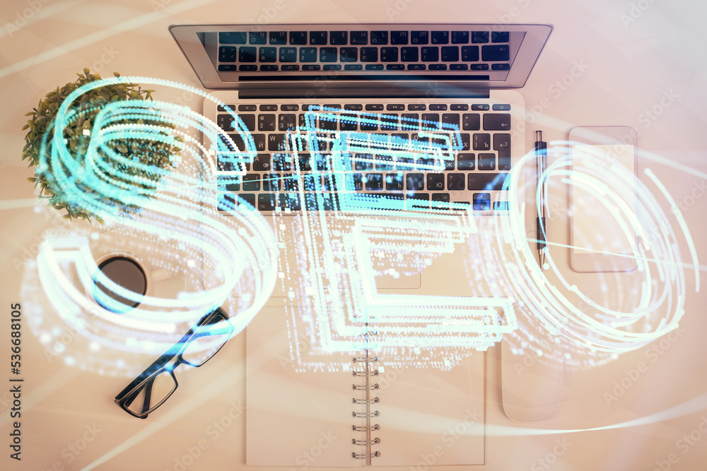 Poster Double exposure of SEO drawing over study table background with computer. Concept of search. Top view.