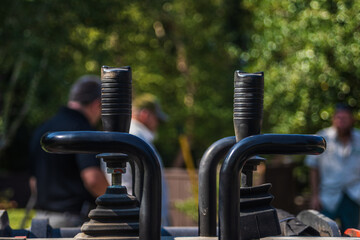 Closeup shot of the joystick controls on a construction machine