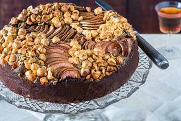 Fototapeta premium Moist chocolate, pear and golden hazelnut torte