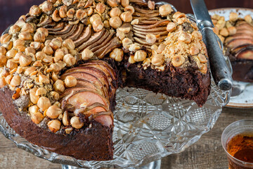 Moist chocolate, pear and golden hazelnut torte