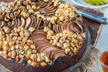 Moist chocolate, pear and golden hazelnut torte