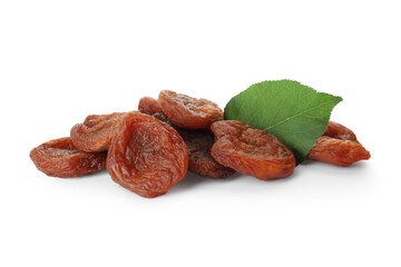 Tasty dried apricots and leaf on white background