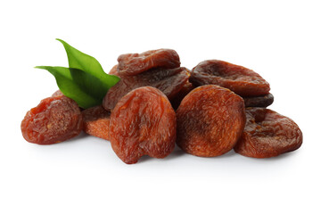 Tasty dried apricots and leaves on white background