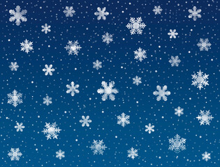 Snowflakes on blue background. Falling snow background. Snowflakes in the night sky 