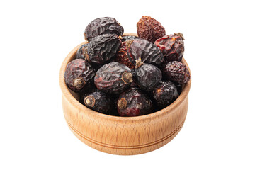Heap of red dry rose hips in wood bowl isolated on a white background.