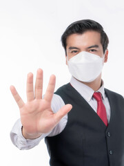 Stop Civid-19 , Asian man wearing Face Mask protect spread Covid-19 Coronavirus on white background