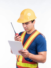 Portrait young architect man engineering with yellow helmet holding megaphone and tablet computer in hand , He standing arms crossed isolated on white background with copy space