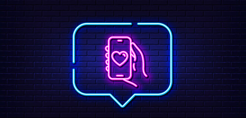 Neon light speech bubble. Dating app line icon. Hand hold phone sign. Cellphone with screen notification symbol. Neon light background. Dating app glow line. Brick wall banner. Vector