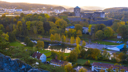 Kungalv fort surrounded by colorful autumn trees during a rainy morning, Gothenburg Sweden