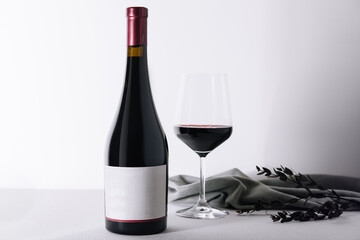 Bottle and glass of red wine