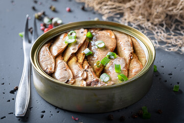 Healthy and tasty smoked sprats in small can.