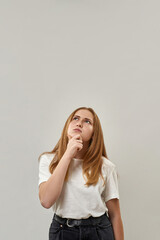 Caucasian teenage girl think on white background