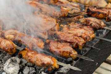 Obraz na płótnie Canvas Cooking kebabs on skewers, closeup photo