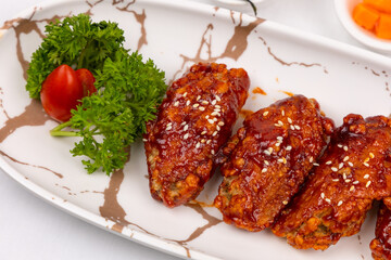 Korean fried chicken in spicy sauce ,  spicy sauce in Korean style